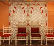 EMBROIDERED BACKDROP WITH HINDU WEDDING CHAIR