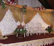 OPEN STAGE WITH EMBROIDERED BACKDROPS